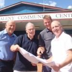 Civil Contractor - Graham Sayer, MCC Vice-President - Phil Simmons, Building Contractor - Ross Meneely & Architect - Norman Richards check plans for the Maleny Community Centre redevelopment